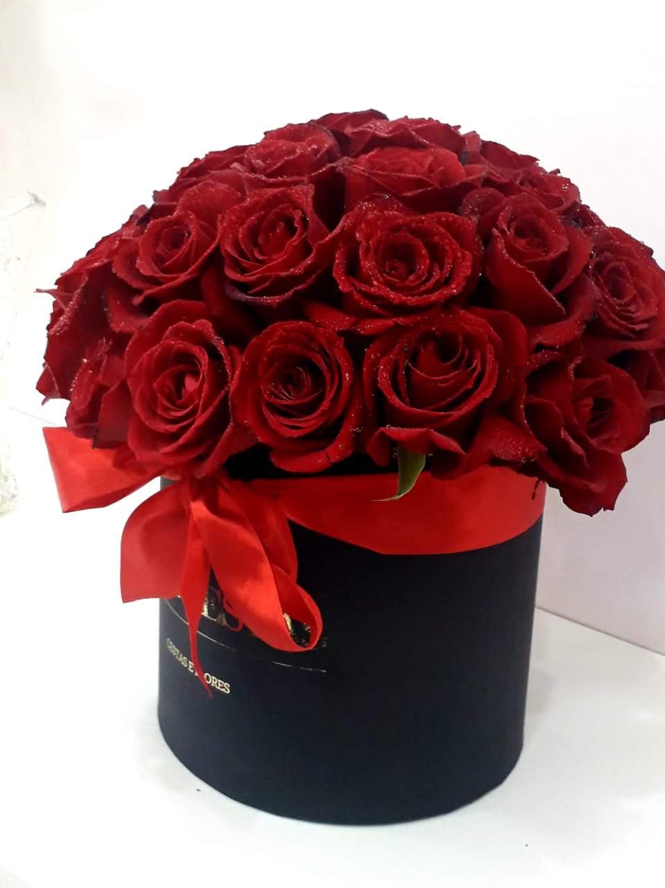 Rosas Vermelhas na Caixa